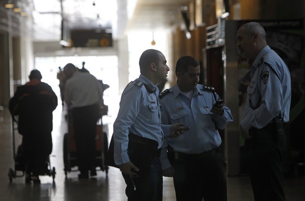 Israeli police officers converse at Ben Gurion International Airport near Tel Aviv April 15, 2012. Hundreds of police officers were deployed in and around Tel Aviv's Ben Gurion Airport, Israel's main gateway to the world, as a pro-Palestinian "fly-in" to Tel Aviv got off to a slow start on Sunday after Israel scrambled to block activists from boarding flights in Europe. REUTERS/Ronen Zvulun